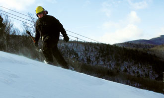 image showing snowmaker walking on snow